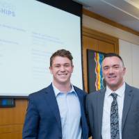 Two guests posing for a photograph.